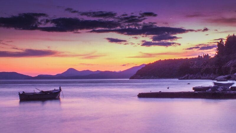 Small Boat on Calm Water — Purple, Serene, Sunset, Photograph, Mountains