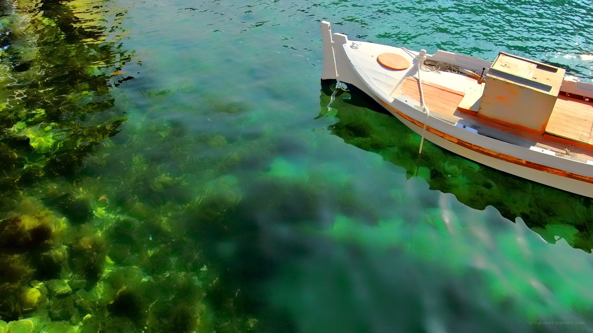 Small boat on clear water