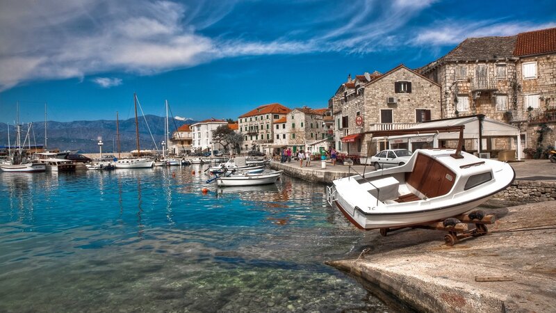 Small Boat on Dock — Blue, Serene