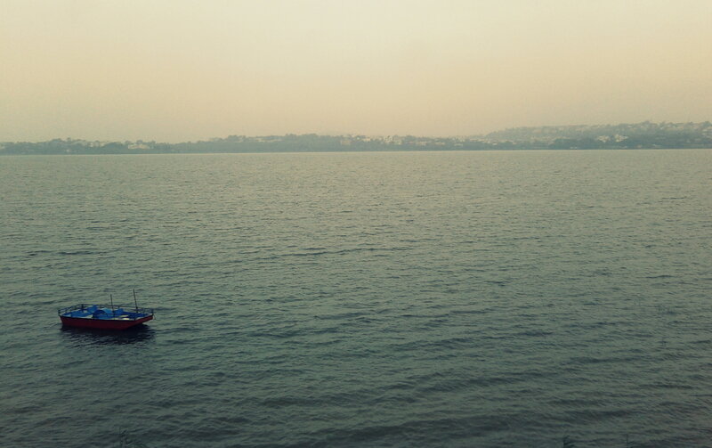 Small Boat on Lake — Blue, Calm