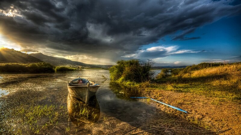 Small Boat on Lake — Blue, Dramatic, Sunset