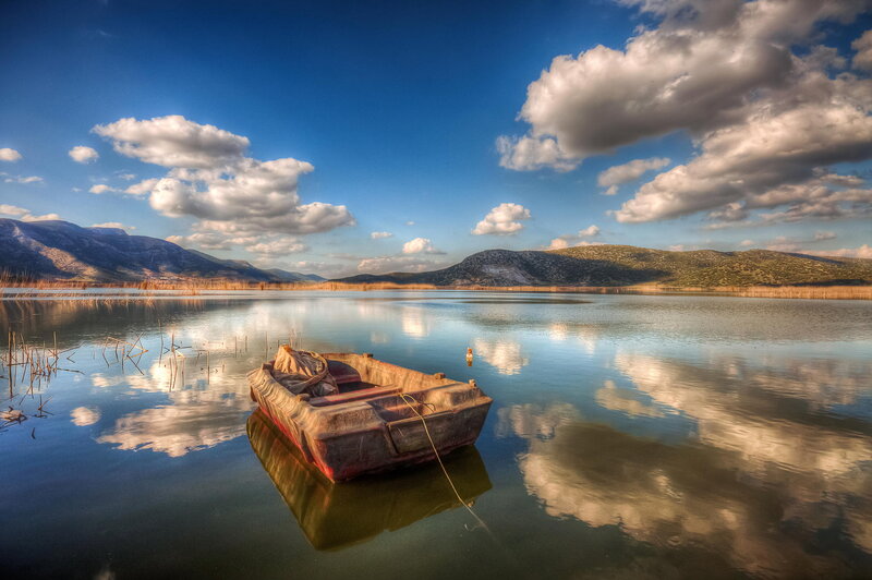 Small Boat on Lake — Blue, Serene, Afternoon, Photograph, Mountains