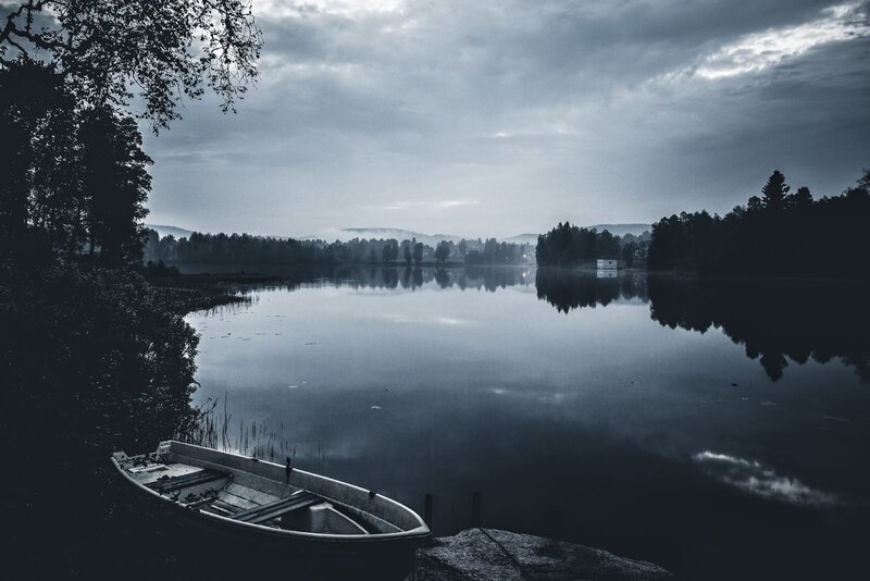 Small Boat on Lake — Blue, Serene, Morning, Photograph, Trees, Clouds