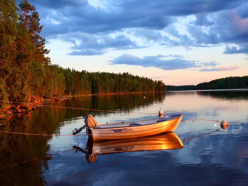 Small Boat on Lake — Blue, Serene, Sunset, Photograph