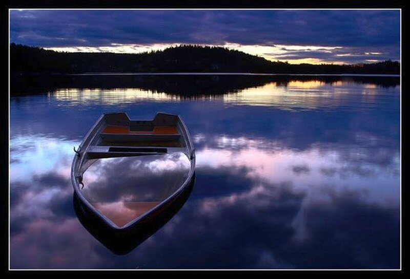 Small Boat on Lake — Blue, Serene, Sunset