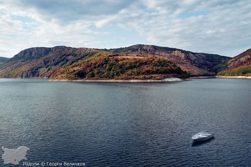 Small Boat on Lake — Blue