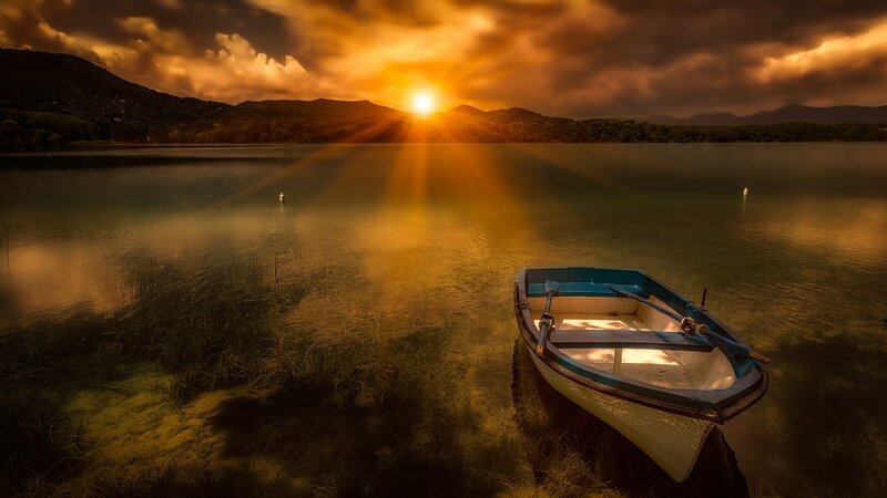 Small Boat on Lake — Gold, Dramatic, Sunset