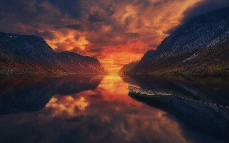 Small Boat on Lake — Orange, Dramatic, Sunset, Photograph, Mountains