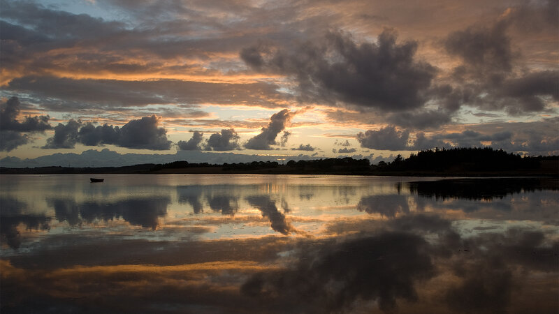 Small Boat on Lake — Orange, Dramatic, Sunset, Photograph