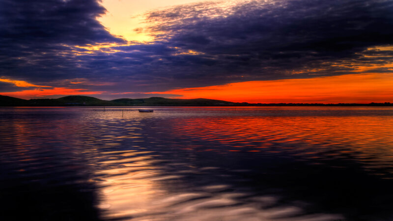 Small Boat on Lake — Orange, Dramatic, Sunset