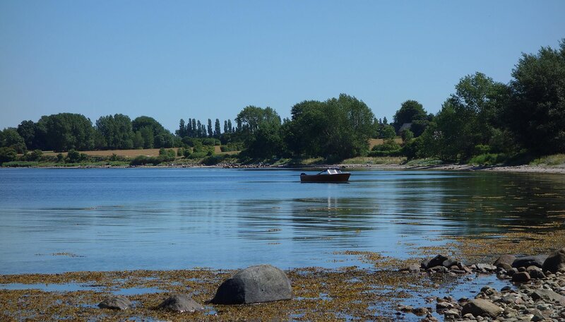 Small Boat on River — Blue