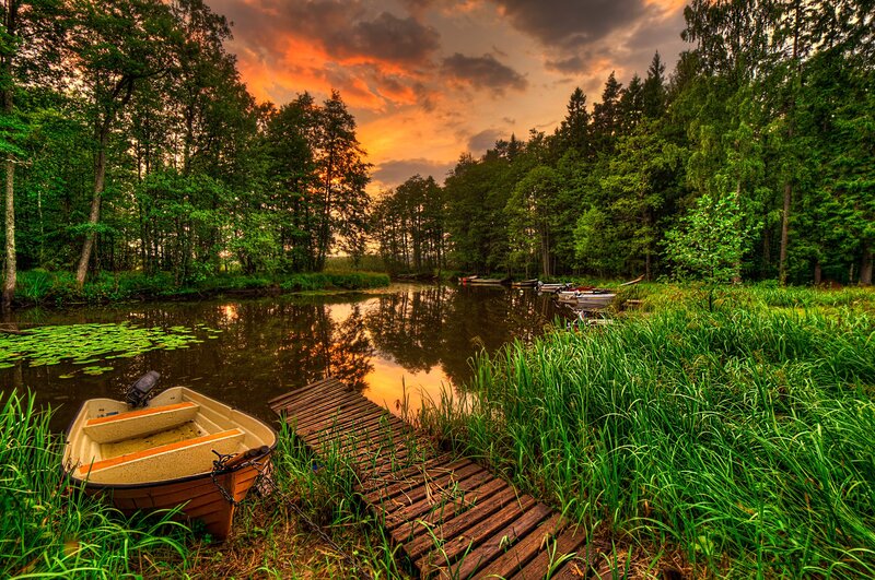 Small Boat on River — Green, Serene, Sunset, Photograph