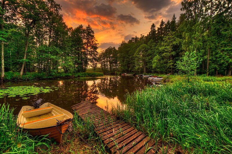 Small Boat on River — Green, Serene, Sunset