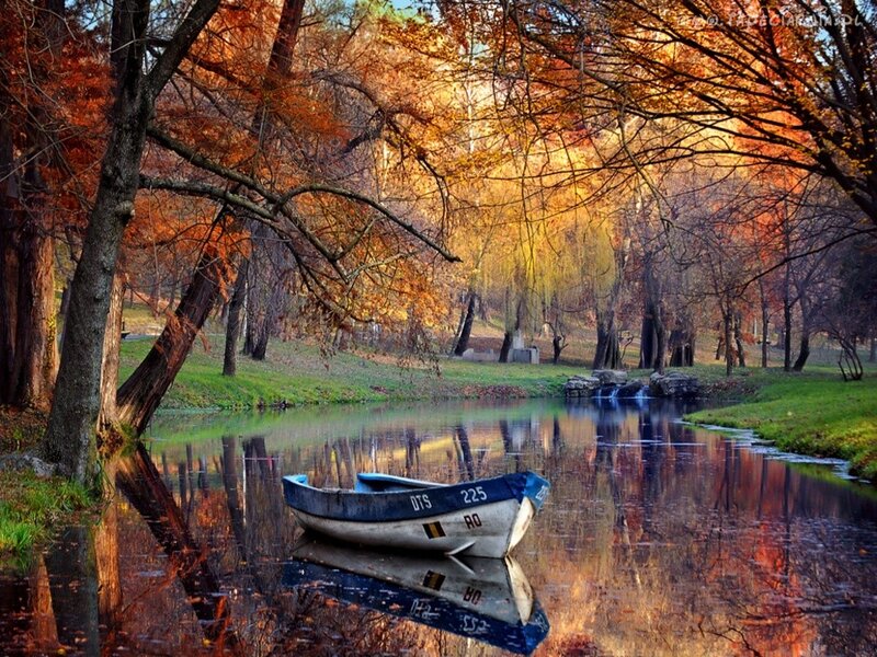 Small Boat on River — Orange