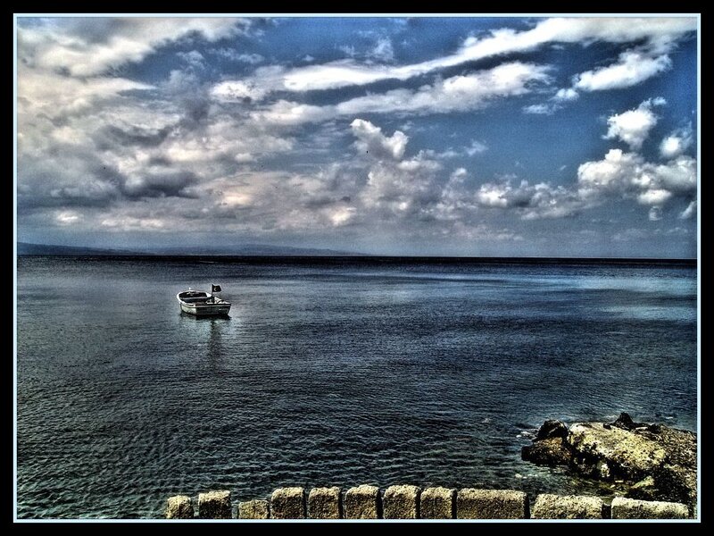 Small Boat on Sea — Blue
