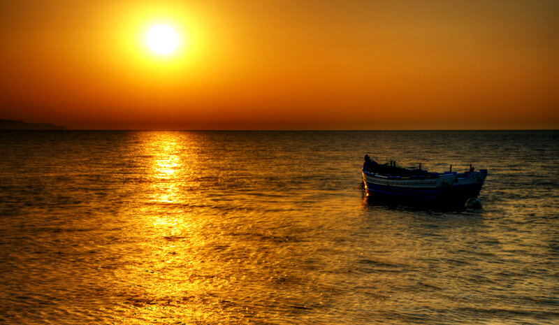 Small Boat on Sea — Orange