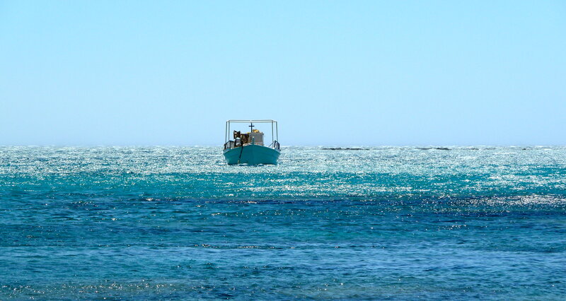 Small Boat on Sea