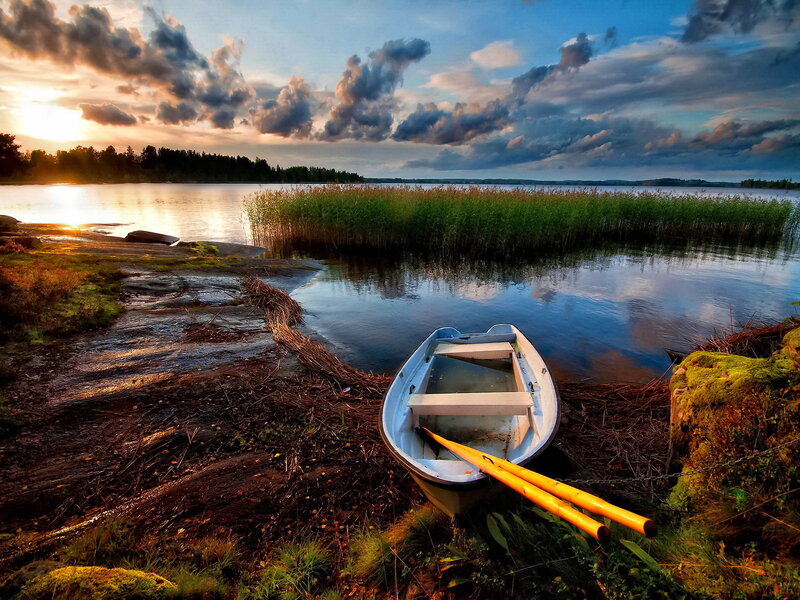 Small Boat on Shore — Blue, Serene, Sunset, Photograph