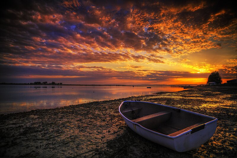 Small Boat on Shore — Orange, Dramatic, Sunset, Photograph, Sky