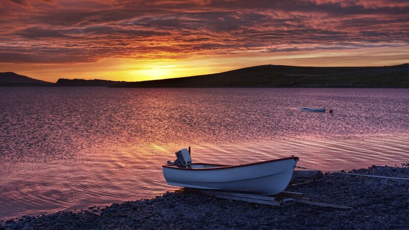 Small Boat on Shore — Orange, Serene, Sunset, Photograph