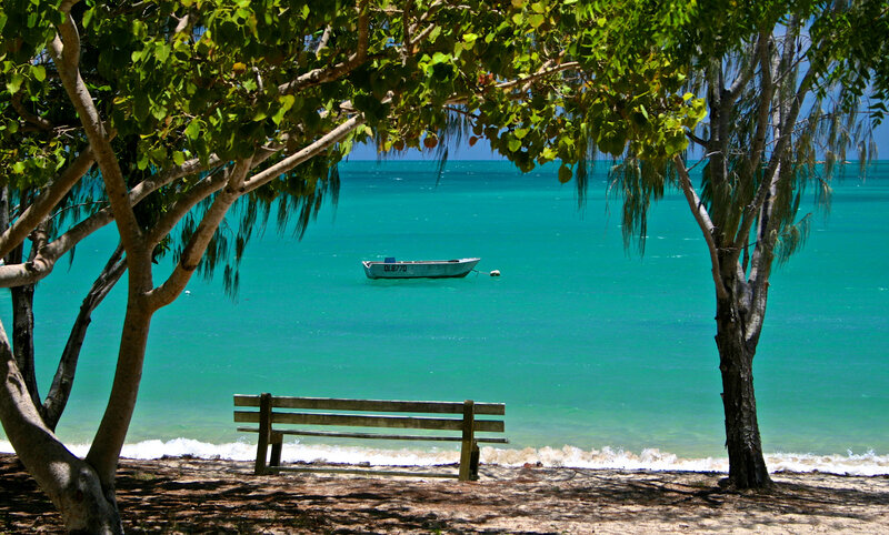 Small Boat on Turquoise Water