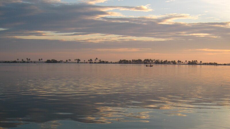 Small Boat on Water — Blue, Serene, Sunset
