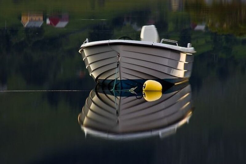 Small Boat on Water — Gray