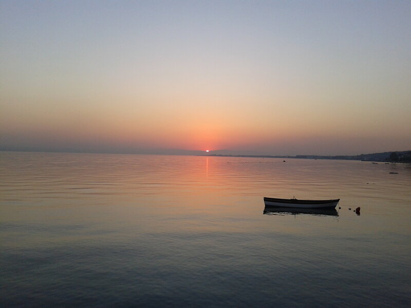 Small Boat on Water — Orange, Serene