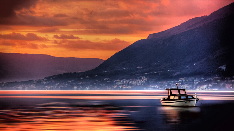 Small Boat on Water — Orange