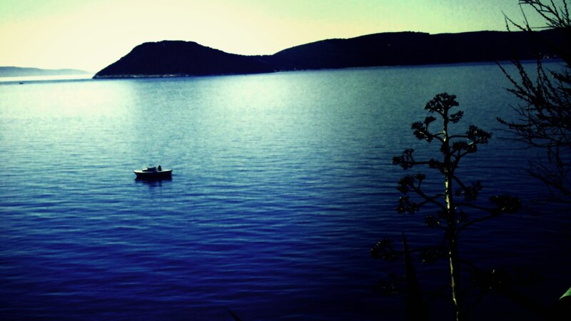 Small Boat on Water