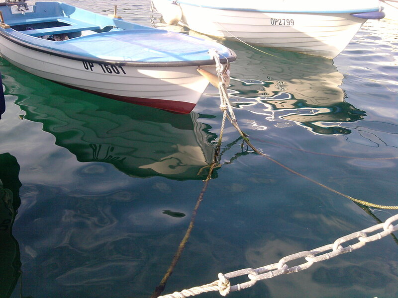 Small Boats in Water