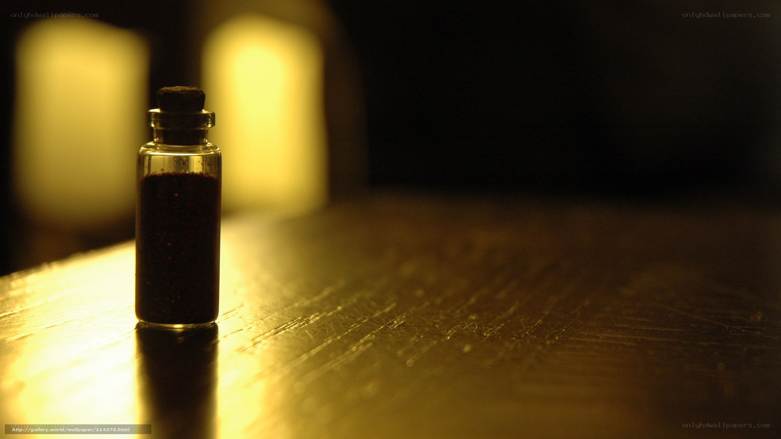 small bottle on wooden table