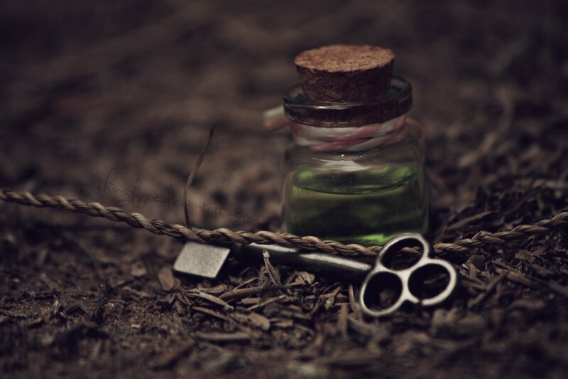 Small Bottle with Key