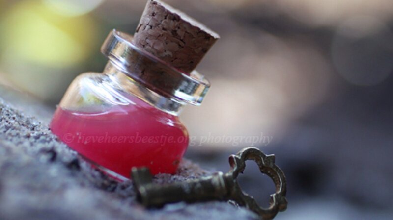 Small Bottle with Red Liquid — Mysterious, Photograph