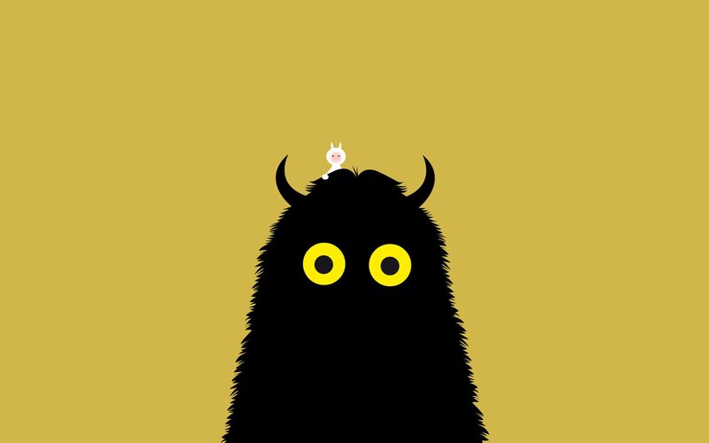 small creature on monster's head