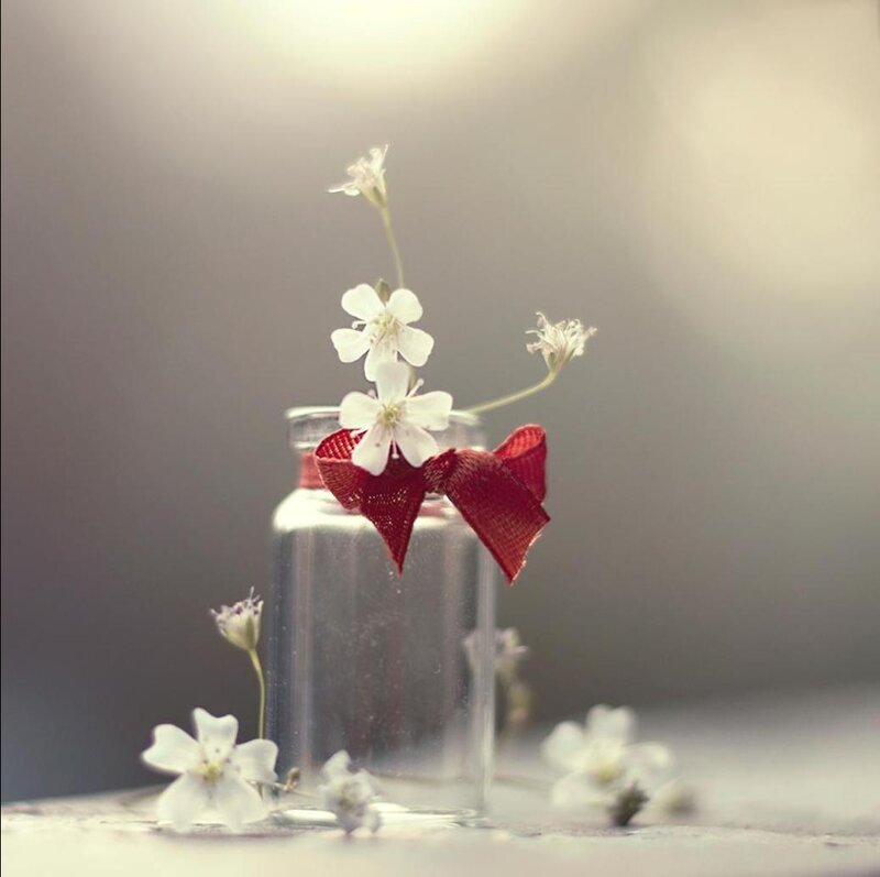 Small Glass Bottle with Flowers