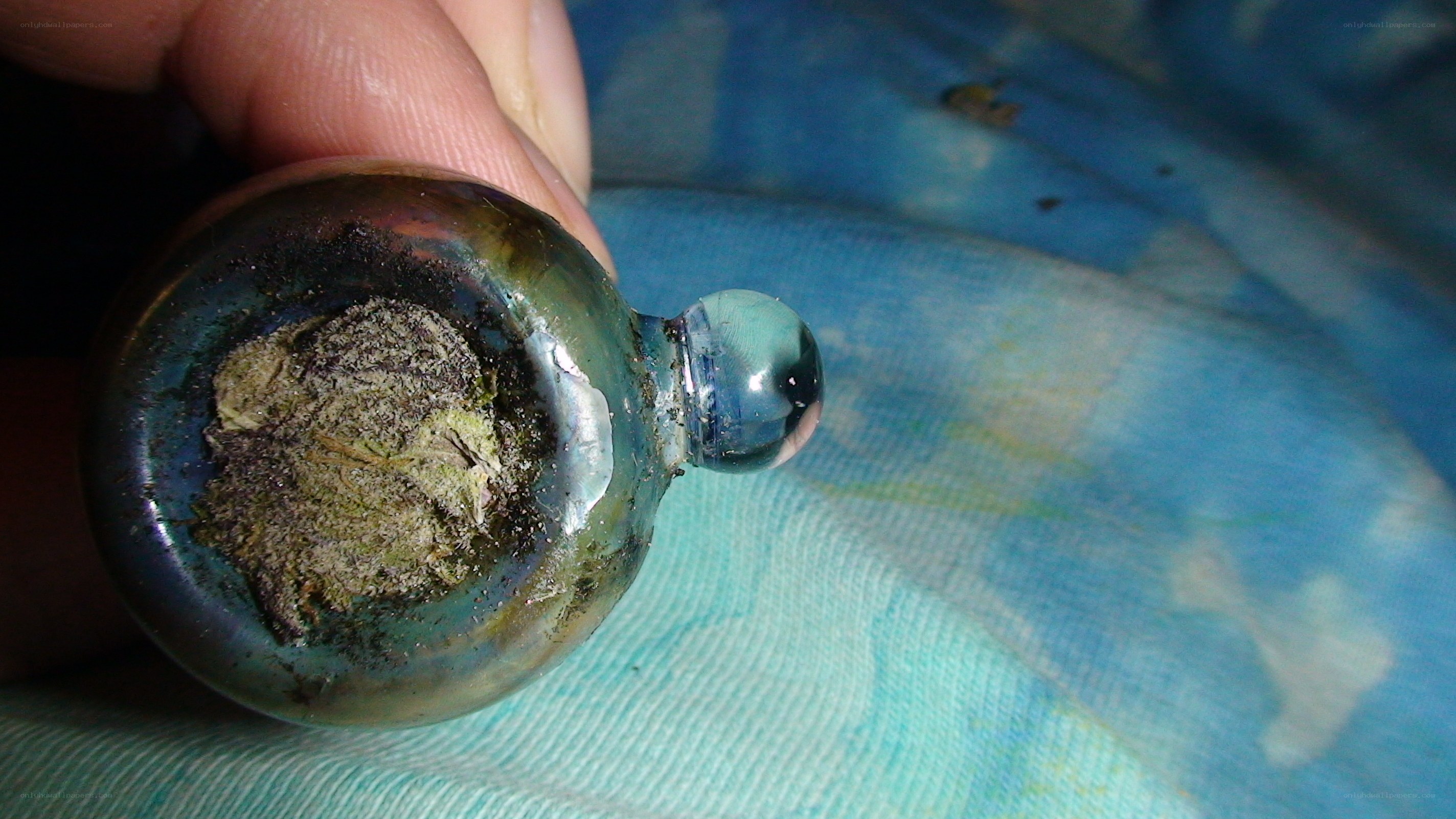 small glass bottle with residue