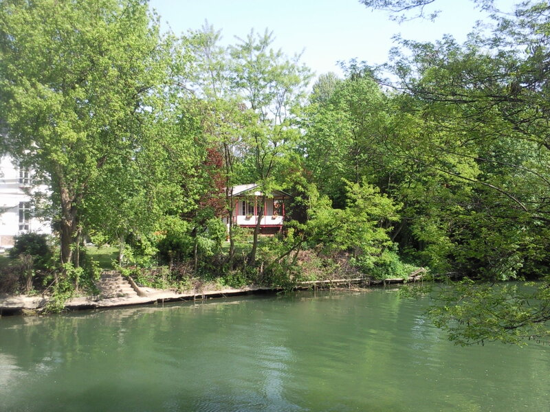 Small House by River — Green