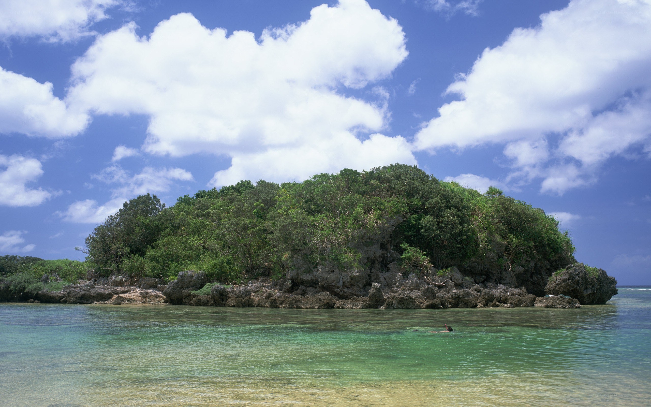 Small island in turquoise water