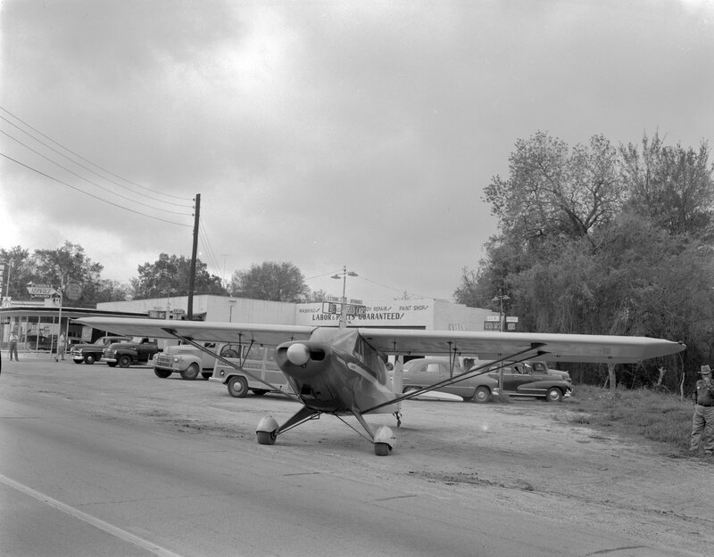Small plane at a service station