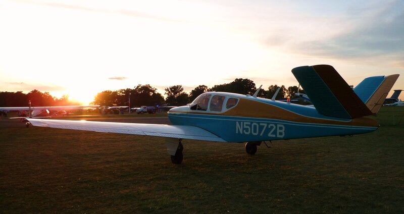 small plane at sunset