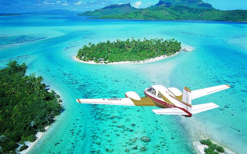 Small Plane over Island — Blue