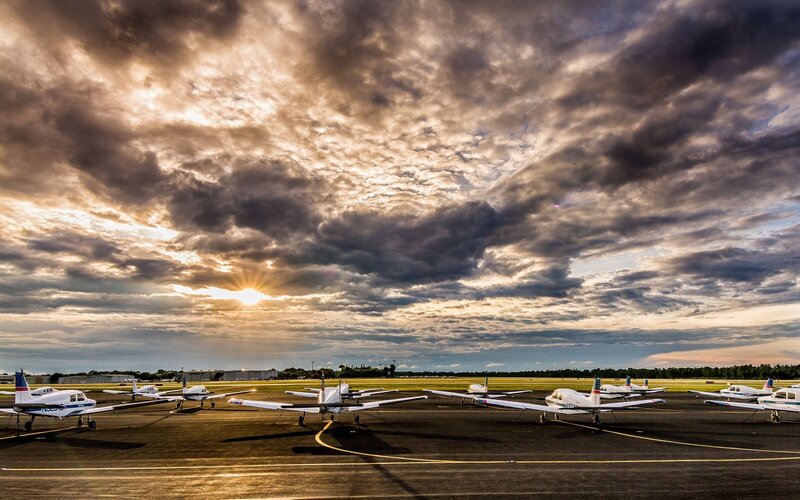 Small Planes on Tarmac — Gray, Dramatic