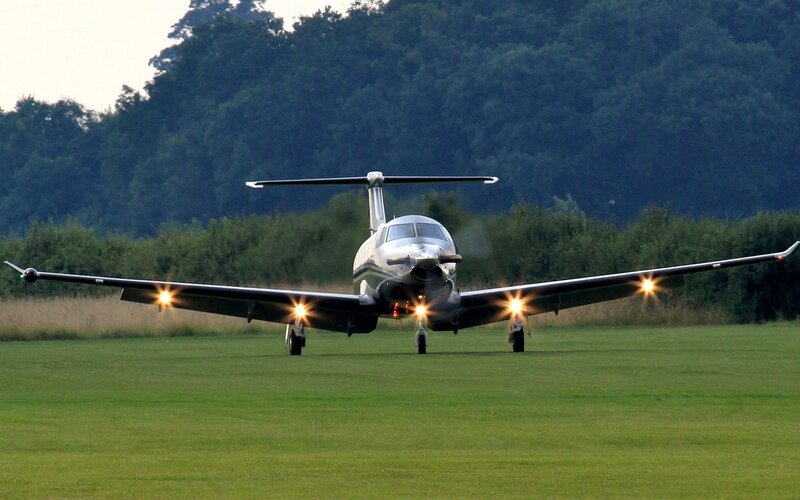 Small Propeller Airplane — Green, Calm