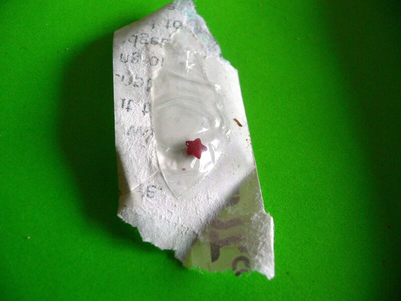 small red star on paper