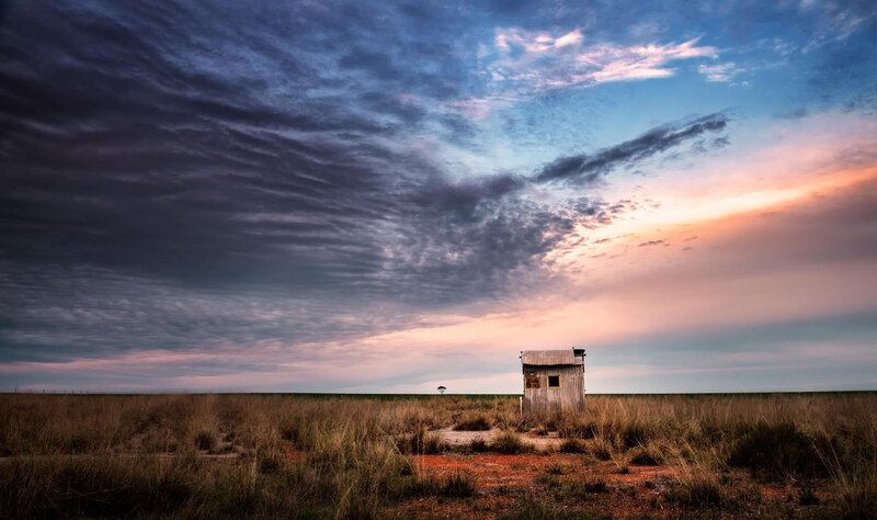 Small Shed in Field — Blue