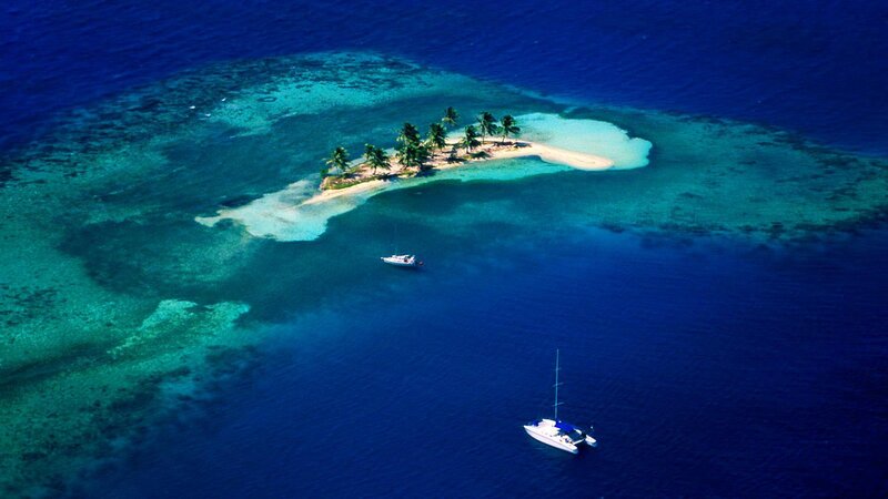 Small Tropical Island — Blue, Serene, Afternoon, Photograph, Boats