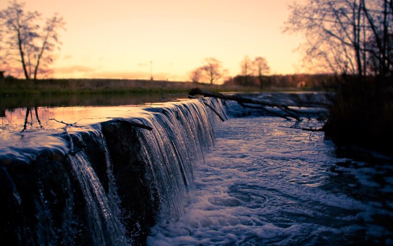 Small Waterfall at Sunset — Orange, Serene