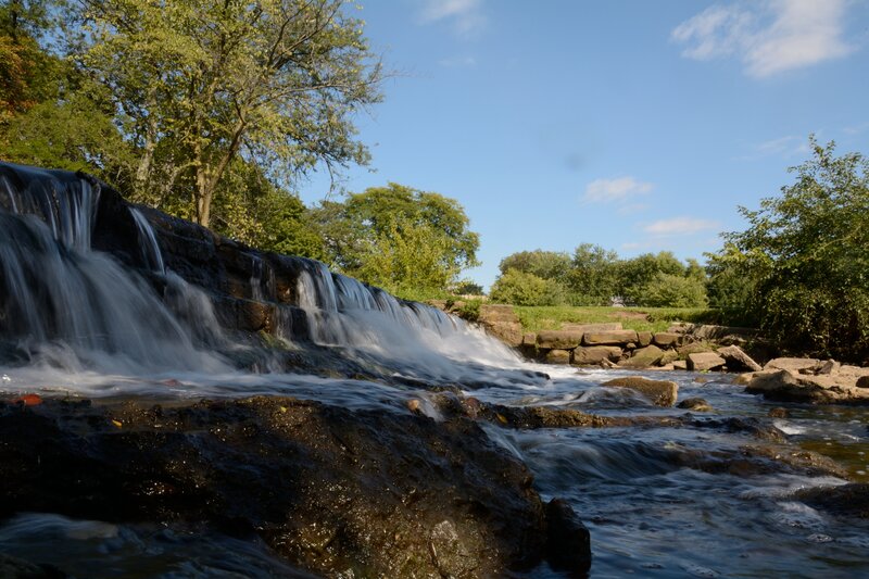 Small Waterfall in Forest — Blue, Serene, Afternoon