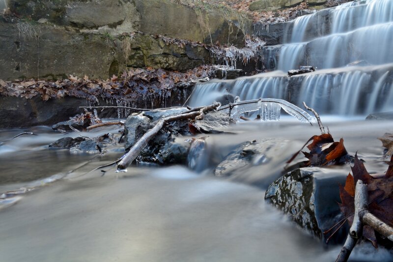 Small Waterfall in Forest — Gray